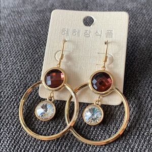 New gold hoop earrings with purple crystal